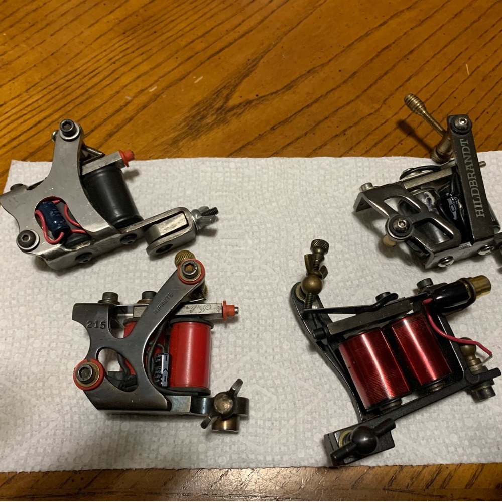 Lot of 4 Coil tattoo machines. All in great condition .